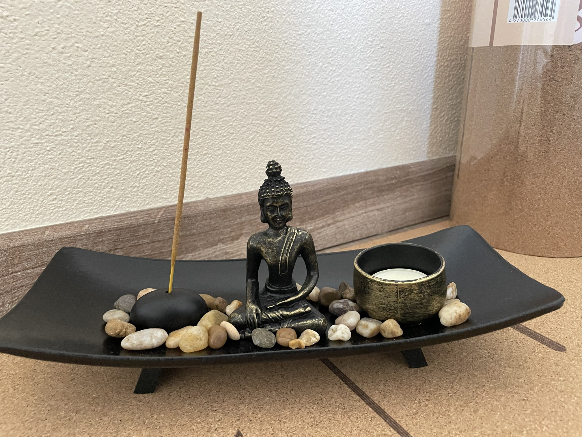 Buddha und Räucherstäbchen